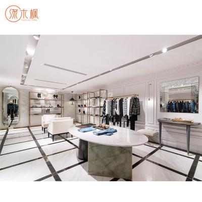 China New Fashion Store Design Factory Supply Clothing Showcase Logo Clothing Store Display Stands Custom Made for sale