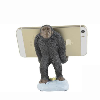 China Lazy Mobile Phone Stand Resin Mobile Phone Holder Stand For Promotional Home Decoration for sale