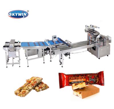 China Automatic Food Skywin Feed and Flow Wrapper Wrapping Machine for Wafer Cookie Chocolate Bar for sale