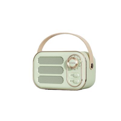 China No Latest Speaker DW13 Style Mini Woofer Speaker With FM Handheld Radio Lovely Vintage Portable Wireless Radio for sale