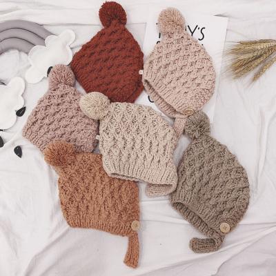 China European and American style 2022 autumn and new winter ear protection knitted ball wool children's hair caps hats for sale