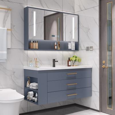 China Built-in ceramic basin is not easy to split wholesale high quality touch screen led mirror locker small bathroom cabinet for sale