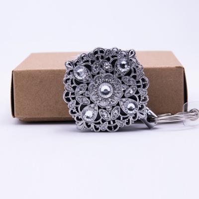 China Retractable Custom Metal Rose Gem Large Stock Reel Badge Holder Pull Reel for sale