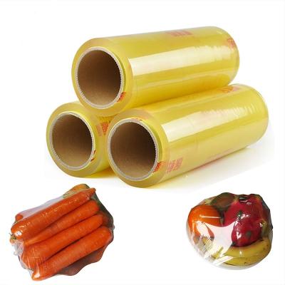 China Factory Direct Selling Fruit Food Grade Moisture Proof PVC Self Adhesive Roll Packaging Plastic Wrap Cling Film for sale