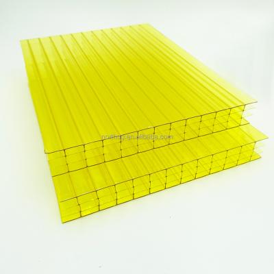 China Contemporary Lightweight Four-Wall Polycarbonate Yellow Hollow Core Plastic Waffer Sheet for sale