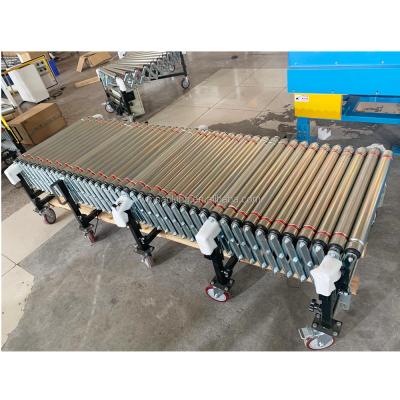 China Heat Resistant Flexible Powered Extendable Retractable Roller Conveyor for sale