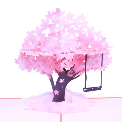 China Europe Cherry Blossom Lover Swing Greeting Card for Valentine's Day Customized 3D Pop Up Card Printing for sale