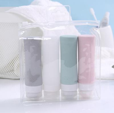 China Personal Care 38ml 60ml 80ml Food Grade Cylinder Travel Silicone Liquid Bottle Set For Cosmetic Shampoo for sale