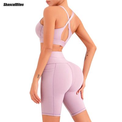 China Shascullfites Breathable Melody Yoga Shorts Set Seamless Gym Biker Shorts Set Active Wear Woman With Pockets for sale