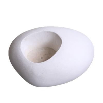 China Minimalist Sandstone Dinosaur Eggs White Gray Brown Brown Planter for sale