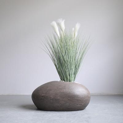 China Environmental Friendly Brown Sandstone Dinosaur Egg 36 Inch 7 Head Green Plant Bonsai Tubular Home Decor Pot Indoor Decoration Art Sets for sale