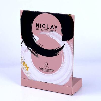 China Eco-friendly Small Countertop Cosmetics Advertising Stand Retail Display Cardboard Box Custom Made For Lip Gloss Eyelashes And Eyeliner for sale