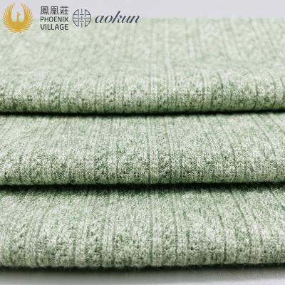 China Hot Sale Village Wicking Phoenix Rayon Polyester Spandex Nylon Fancy Fabric Squishy Fabric For Garment Texture Knit for sale