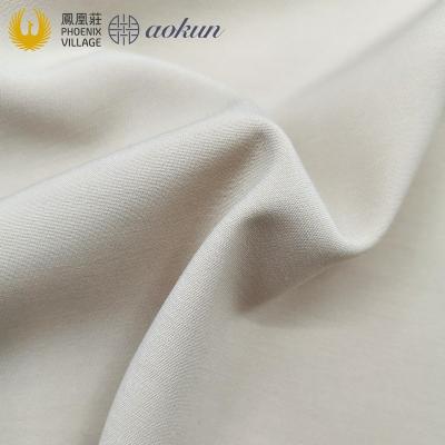 China Phoenix Village Hot Sale Polyester Rayon Spandex Fabric Viable Stretch Woven Viscous Fabric For Suit And Pants for sale