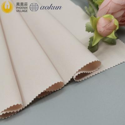 China Stain Resistant Phoenix Village Hot Sale Polyester Spandex Fabric Bi-stretch Woven Fabric For Suit And Pant for sale