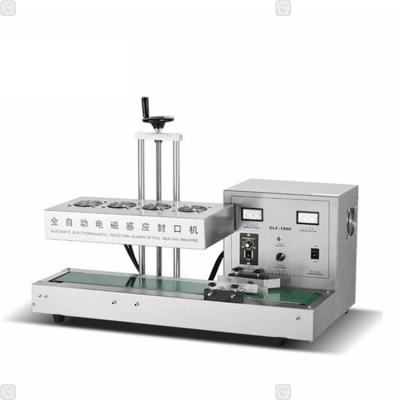 China Tin Foil Sheet Sealing Machine High Efficiency YTK Aluminum Foil Gasket Sealing Machine for sale