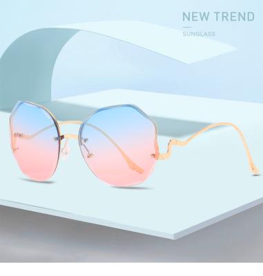 China Fashion Sunglasses Dachuan Live Show Promotion Round Ocean Clear Lens Metal Curved Shaped Rise Sunglasses for sale