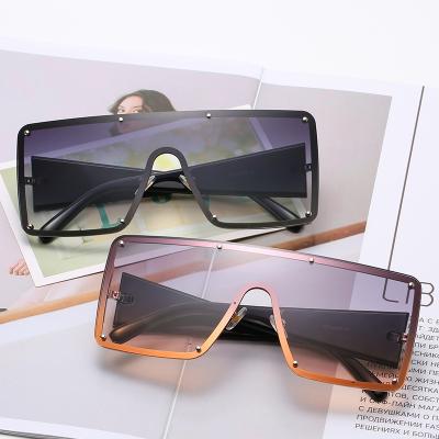 China DCOPTICAL Fashion Rimless Sunglasses Trendy Dark Lenses 2022 Filter Shades Light Brown Women Oversized Sunglasses for sale