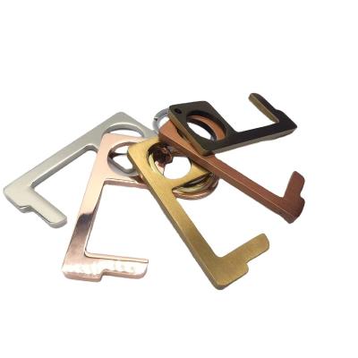 China Hot Selling Multifunctional Metal Hands Free No Touch EDC Door Opener Key Chain for sale