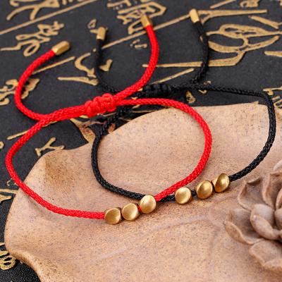 China Environmentally Friendly Ethnic Gold Plated Handmade Braided Adjustable Black Red Women Lucky Tibetan Buddhist Charm Copper Beads String Bracelet Jewelry for sale