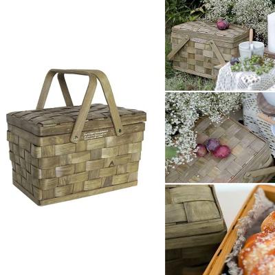 China Sustainable Woven Wedding Wooden Storage Baskets Sundries Decoration Fruit Basket Picnic Basket With Lid And Handles for sale