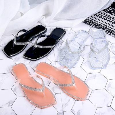 China Damping 2022 Flat Ladies Jelly Slides Shoes Rhinestone Luxury Jelly Flip Flops Fashion Summer Bling Sandals Slippers for sale