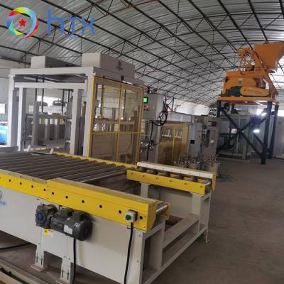 Cina Sistema di controllo automatico PLC Linea di produzione di veneer stone Concreto di blocco di contenimento di riempimento macchina in vendita