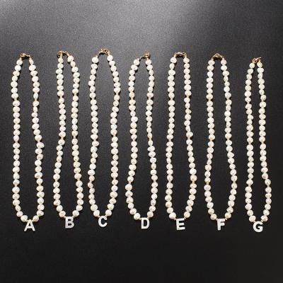 China Trendy Trendy Hawaiian Jewelry 18k Gold Plated Baroque Freshwater Pearl Necklace Initial Letter Necklace For Women for sale