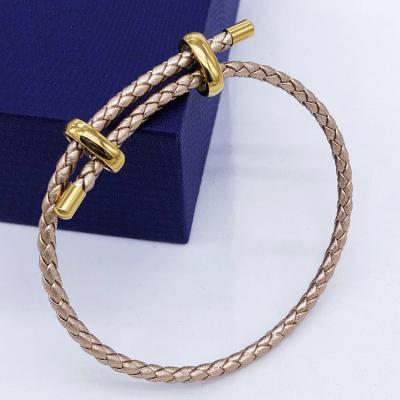 China Genuine Leather Braided Leather Bangle Bracelet Gold Plated Stainless Steel Leather Bangle Bracelet For Women Men for sale