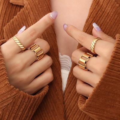 China TRENDY RS1048 Non Tarnish 18K Gold Plated316LStainless High Quality Tasty Single Twist Steel Rings For Women for sale