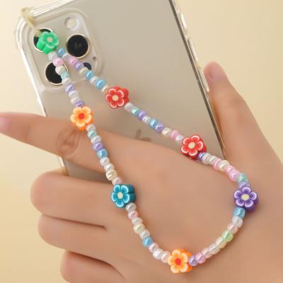 China Stylish 90s Style Multicolor Colorful Tiny Seed Beaded Smiley Flower Phone Accessories Charm Chain Straps Evil Eye Love Heart for sale