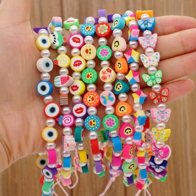 China Stylish Multicolor Heart Smiley Butterfly Ice Cream Yin Yang Evil Eye Polymer Clay and Beaded Pearl Phone Accessories Charm Chain Strap for sale