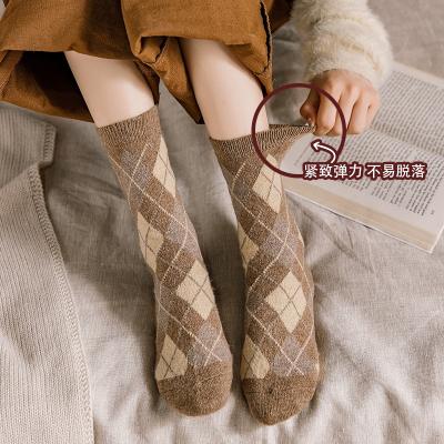 China 2021 hot sale women QUICK DRY factory fashion new warm to thicken retro college style tube coffee color stacked medium socks for sale