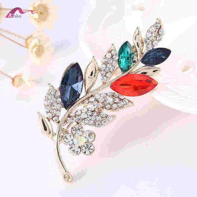 China Korean artificial feather brooches wholesale colorful rhinestone brooches definition for sale