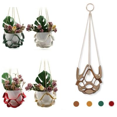 China Fasion Hot selling Leather Plant Hanger Macrame Wall Hanging Planter Flower Pot Holder Shelf Decorative Home Decor PU Leather for sale