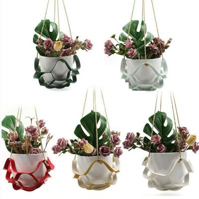 China Fasion Plant hanging Indoor Plant Hanger Holder PU Leather Flower Basket Hanger Garden Plant Wall Pot Hangers Hanging Baskets Planter for sale