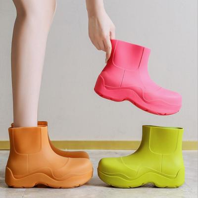 China Damping New Solid Color Around Rain Boo Women Ladies Rain Boots Toe Shoes Thick Soled Short for sale