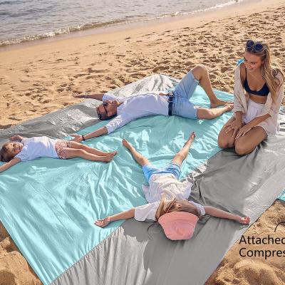 China Nylon Oversized Sand Picnic Beach Blanket Portable Folding Waterproof Free Sand Beach Mat for sale