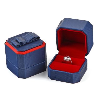 China Hot Selling Luxury Gorgeous Fashionable Octagon Bowknot Blue Jewelry Ring Box Pu Leather for sale