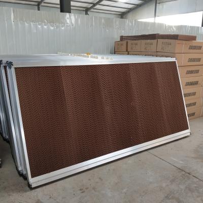 China Farms Poultry Chicken Cage With Indirect Ventilation System Exhaust Fan Wet Paper Curtain Evaporative Cooling Pads Cooling Price for sale