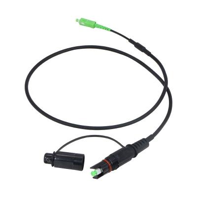 China Outdoor Mini IP LC SC MPO 24F 7.0mm Black Outdoor Patch Cord Waterproof IP68 Cable MPO To LC Fiber Optic Patch Cable for sale