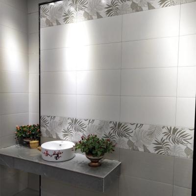 China Light Grey Wall Tile Pearl Glazed Decorative Design Toliet Washroom Ceramic Wall Tiles for sale