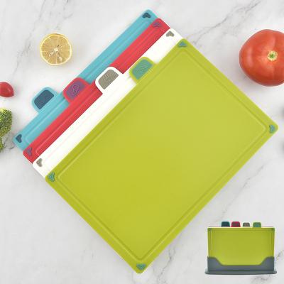 China Stocked Kitchen Multifunctional Plastic Cutting Board 4pcs Classified Set Customized Chopper Factory for sale