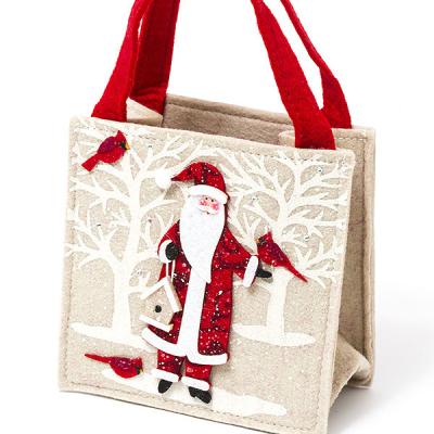 China Europe 2023 New Design Factory Wholesale Durable Soft Wool Felt Fabric 3d Santa Claus Child Candy Gift Wrapping Bag for sale