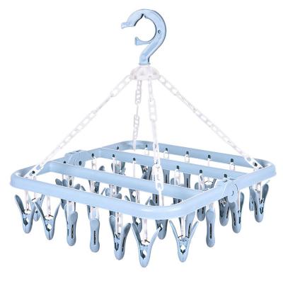 China Contemporary 32 Nails Color Hanging Plastic Fabric Cloth Hanger Cloth Hanger for sale