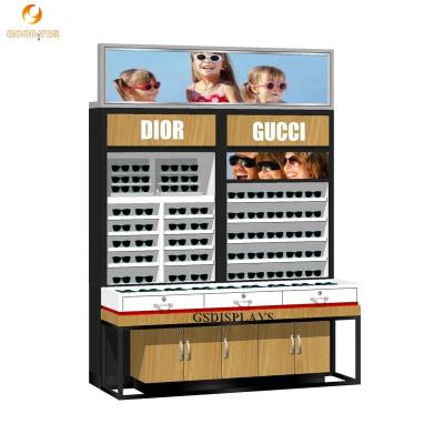 China MDF+Tempered glass+led+metal shelf retail store furniture wall mounted eye wear optical glasses display showcase customized wooden sunglasses display cabinet for sale