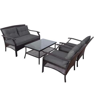 China Outdoor Weather Furniture 4-Piece Rattan Garden Sofa With Cushions Tempered Glass Cover Coffee Table Suitable For Different Outdoor Spaces for sale