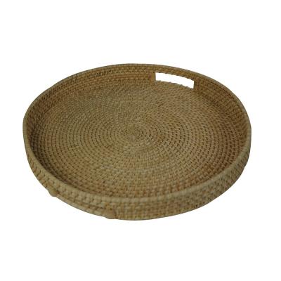 China 2021 viable trending in gifts and crafts wholesales handmade round rattan fruit bread coffee tea woven trays basket for sale