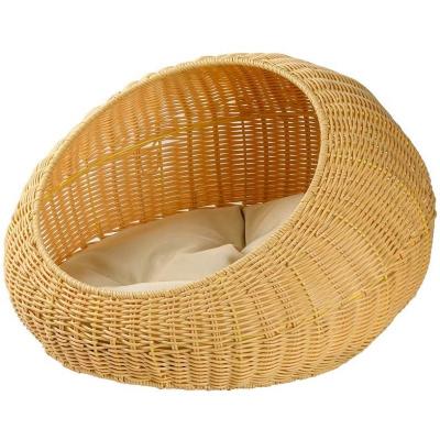 China 2021 Sustainable Tending Handcrafted Rattan Round Beds With Soft Cushion For Cats Or Small Dogs Wicker Basket Pet House for sale