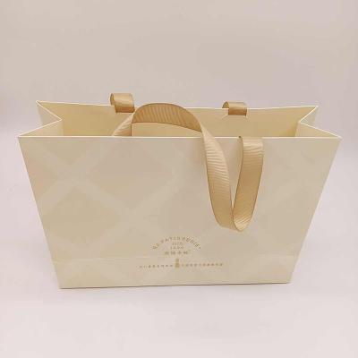 China Recycled Materials Color Printing Custom Commercial Luxury Gift Shopping Paper Bag for sale